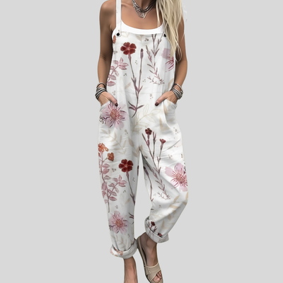 Weiße Latzhose mit roten Blüten